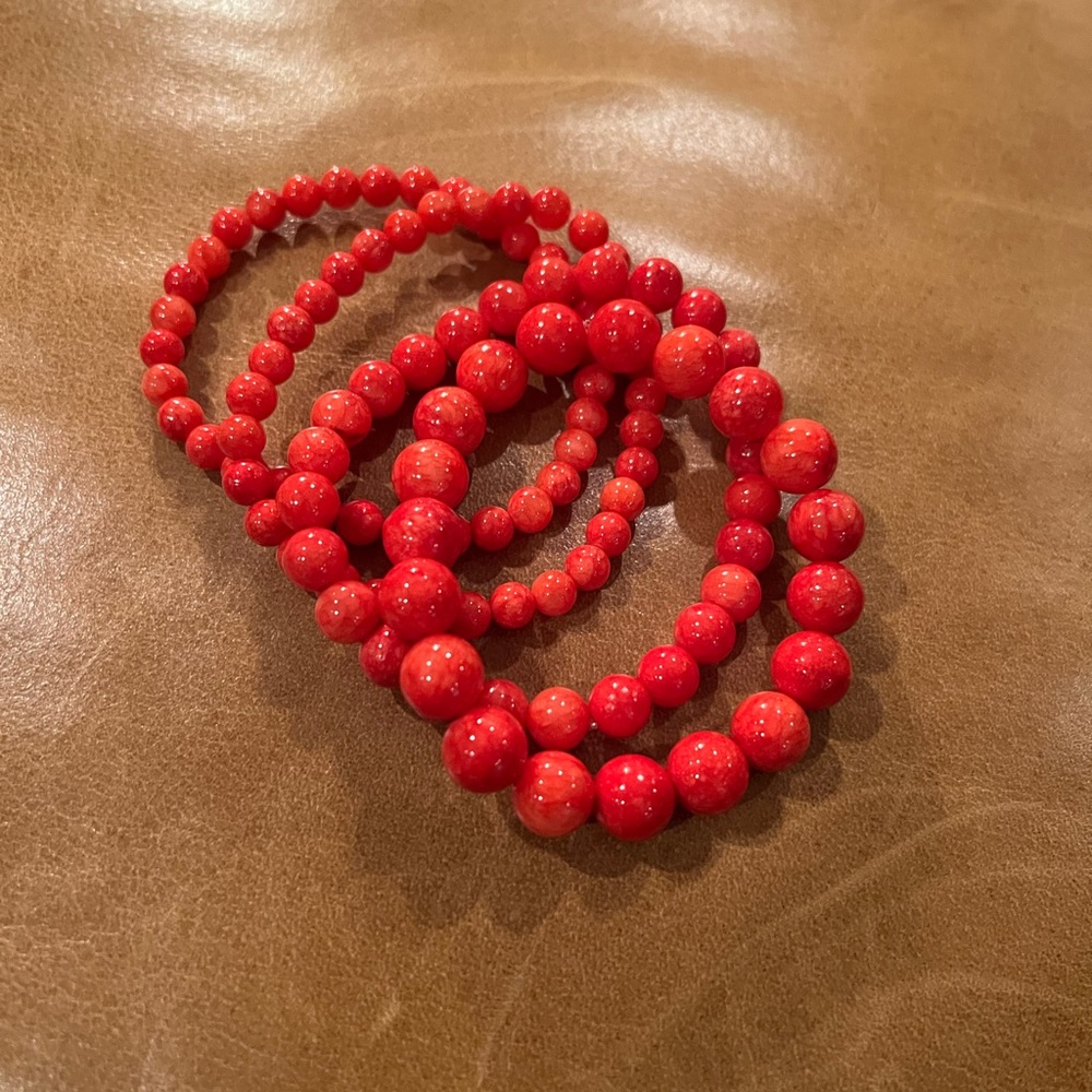 Four Coral Colored Plastic Bracelets Fashion Jewelry
